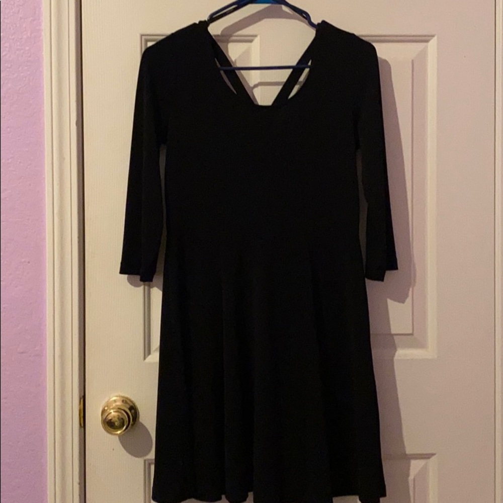 Black 3/4 sleeve mini dress with cross back design